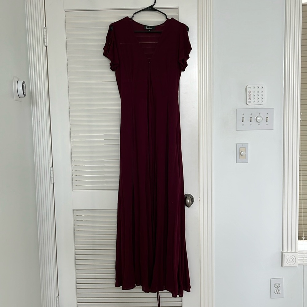 Burgundy red dress perfect for weddings. Tailored for a person who is 5’ 3”.